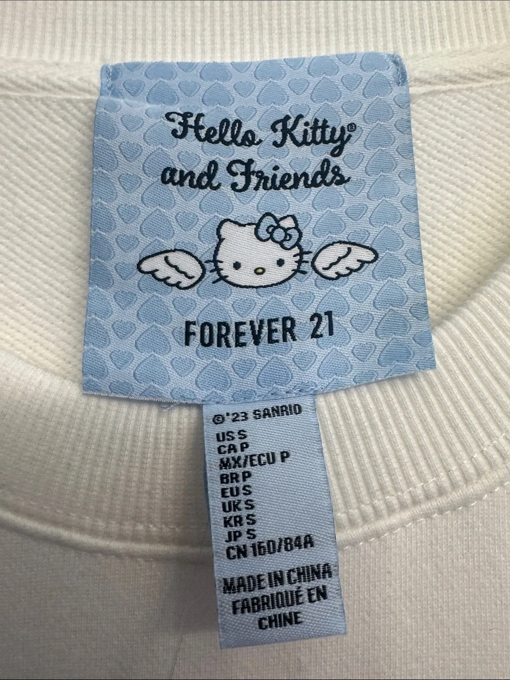 Forever 21 Cream Embossed Hello Kitty Crewneck Sweatshirt